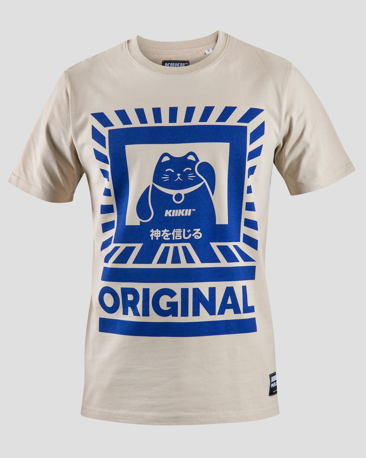 A cream t-shirt with a printed graphic hanging on display.